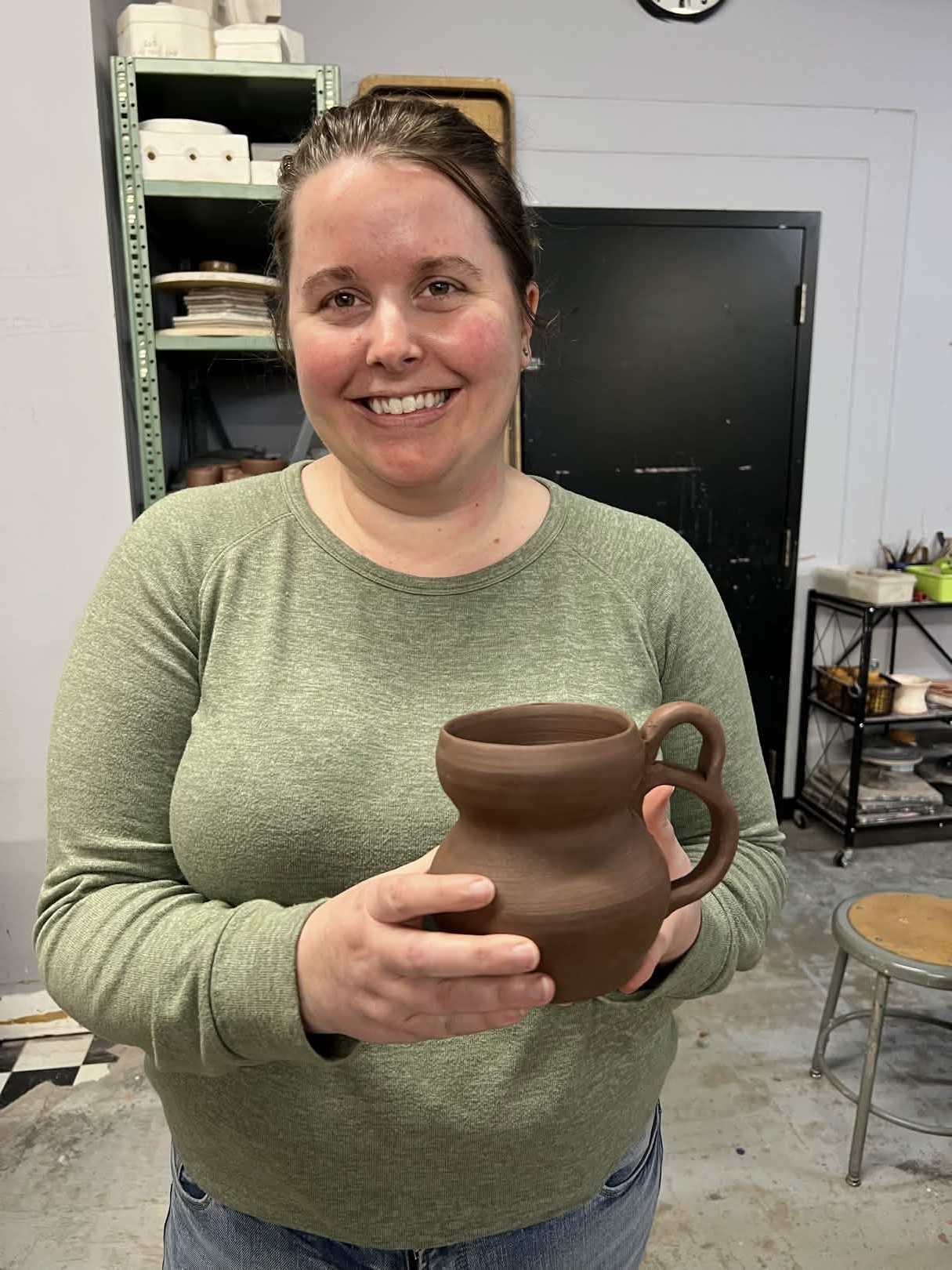 Codi experimenting with mugs and handles.